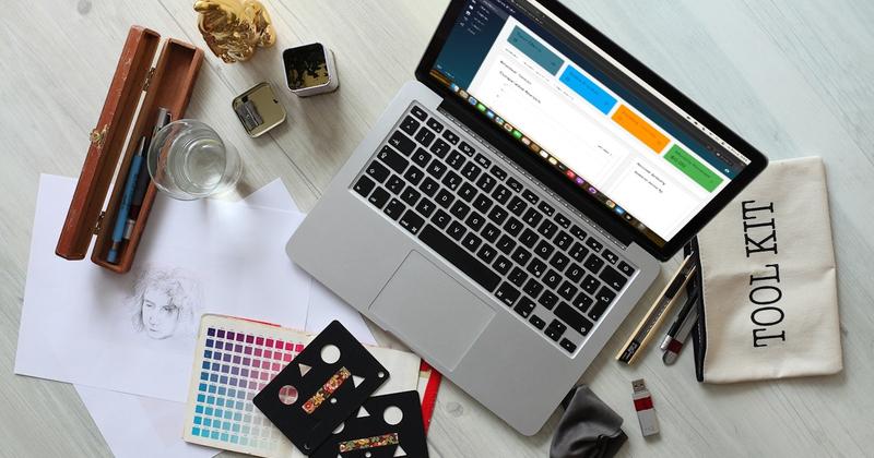 Laptop with a dashboard open on a creative workspace